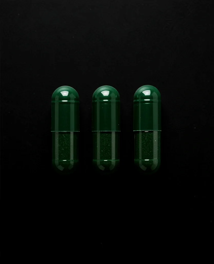 Macro view of a supplement capsule in low-key studio lighting